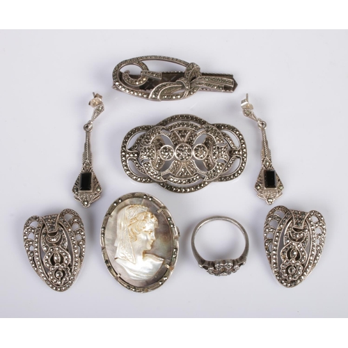 438 - A quantity of silver marcasite jewellery, to include brooch, cameo brooch, clip on earrings, ring an... 