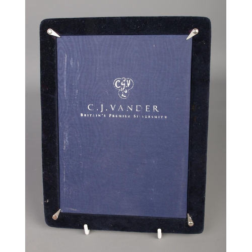 482 - A C.J Vander silver mounted photo frame of rectangular form. Approx. dimensions of photo insert 13cm... 