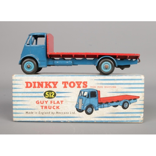 483 - A boxed Dinky 512 'Guy Flat Truck'. In blue and red livery.