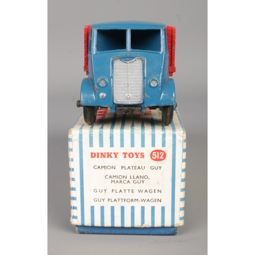 483 - A boxed Dinky 512 'Guy Flat Truck'. In blue and red livery.