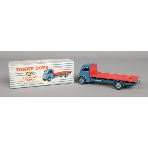 483 - A boxed Dinky 512 'Guy Flat Truck'. In blue and red livery.