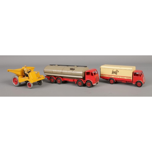 486 - Three boxed Dinky die-cast vehicles. To include Dinky 562 (later renumbered 962) Muir-Hill Dumper Tr... 