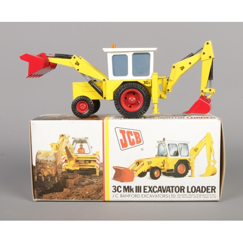 495 - A boxed NZG Modelle No. 105 JCB 3C MkIII Excavator Loader.