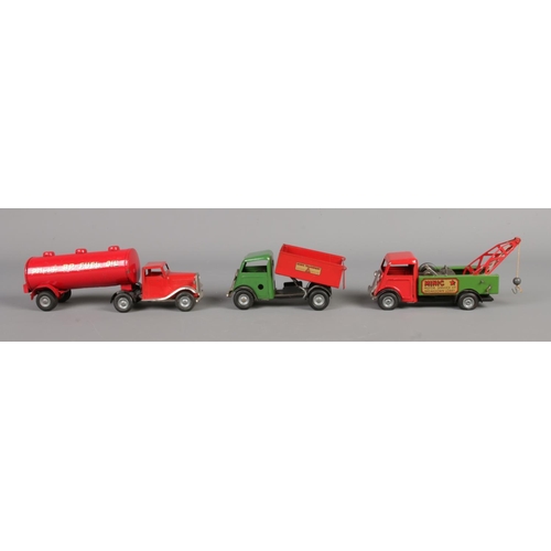 506 - Three Tri-ang clockwork vehicles. Consists of Shell BP Fuel Oil Lorry, 'Minic Transport' tipper and ... 