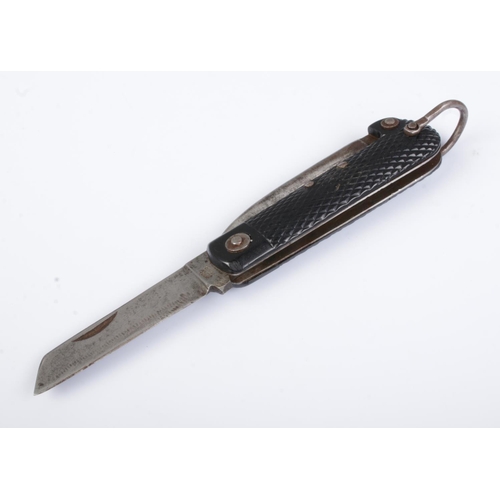 509 - A WWII era British Army folding knife, with chequered body and makers mark J.Nowill & Sons stamped t... 