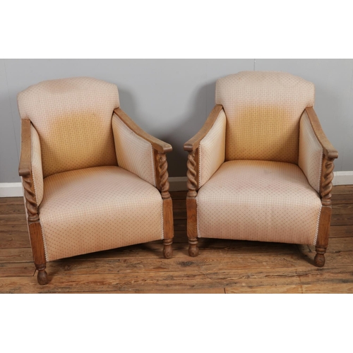 525 - A pair of 1930's oak framed barley twist armchairs