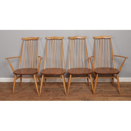 528 - An Ercol light Sutherland style dining table, together with four Ercol Blonde Elm 'Goldsmith' chairs... 