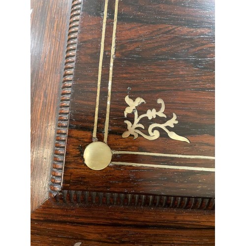 45 - An early Victorian rosewood table top sewing cabinet with mother of pearl inlaid decoration. Having ... 