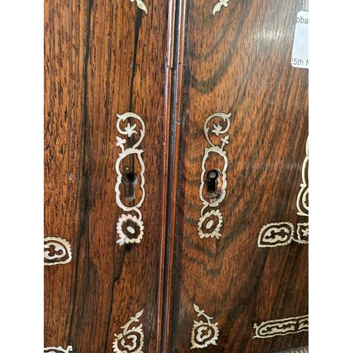 45 - An early Victorian rosewood table top sewing cabinet with mother of pearl inlaid decoration. Having ... 