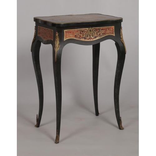 673 - A 19th century ebonised rosewood vanity table. Having boulle work decoration. Height 73.5cm, Width 5... 