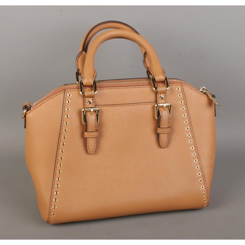 15 - A brown Micheal Kors bag with strap.