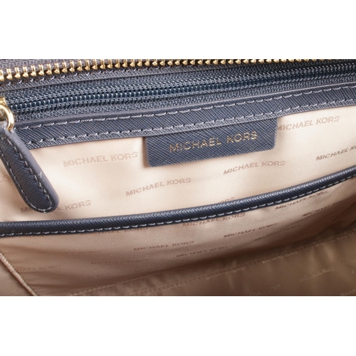 20 - A blue Michael Kors navy leather satchel with dust cover.