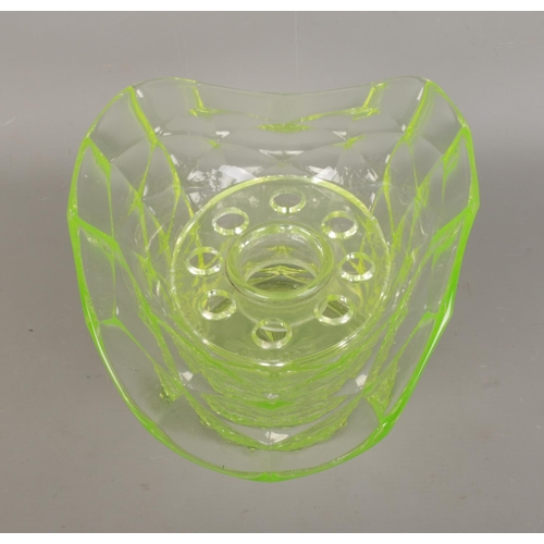 23 - An Art Deco Uranium/Vaseline glass flower vase with frog stem holders. Width 26cm, height 16cm, dept... 