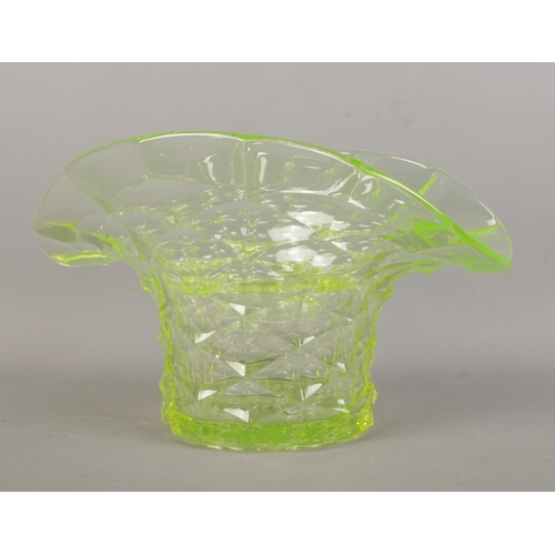 23 - An Art Deco Uranium/Vaseline glass flower vase with frog stem holders. Width 26cm, height 16cm, dept... 