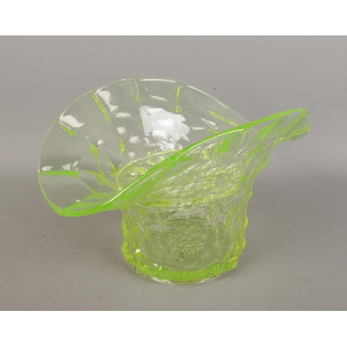 23 - An Art Deco Uranium/Vaseline glass flower vase with frog stem holders. Width 26cm, height 16cm, dept... 