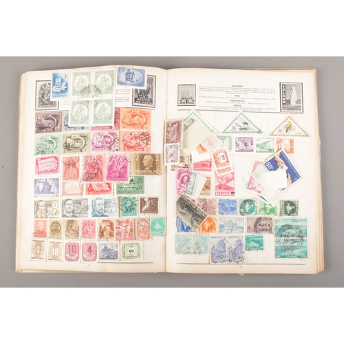 28 - Three albums containing a collection of Great British and world stamps, first day covers and cards.