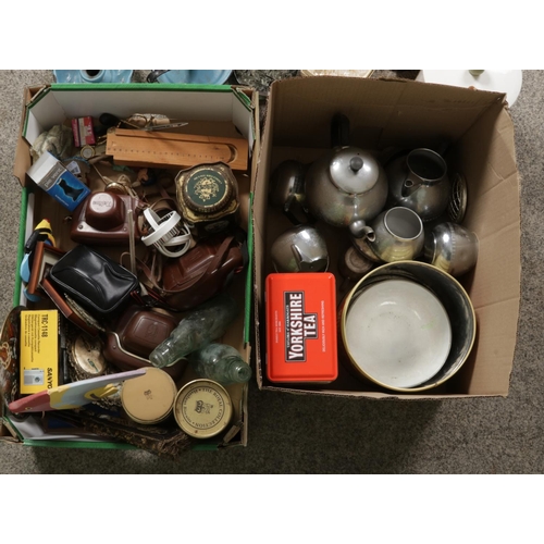 324 - Two boxes of miscellaneous. Includes cameras, glass advertising bottles, tins, Swan Brand tea wares,... 