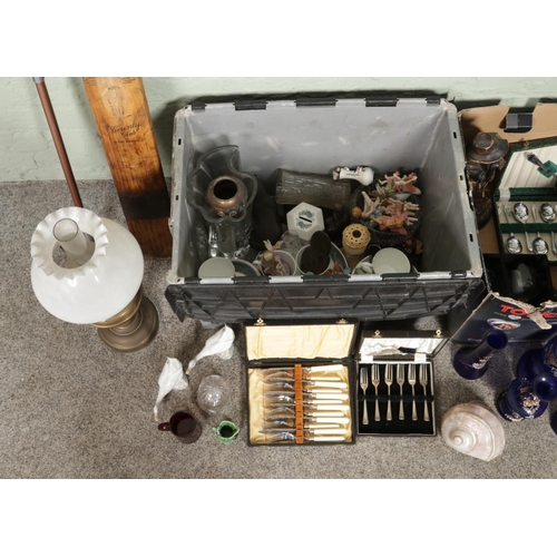 340 - Two boxes of assorted miscellaneous, to include cased flateware, a pair of composite figures stamped... 