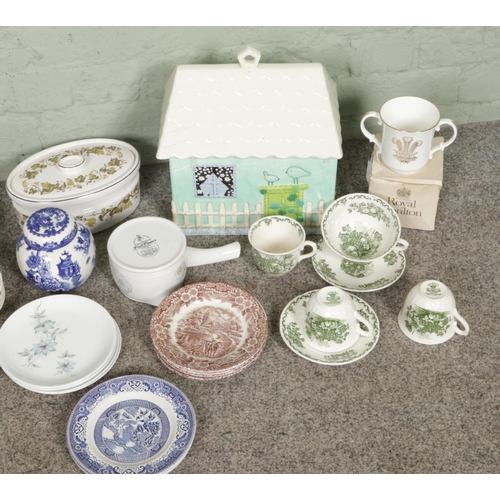 349 - Collection of assorted collectible ceramics, including a large ceramic gingerbread house, Royal Doul... 