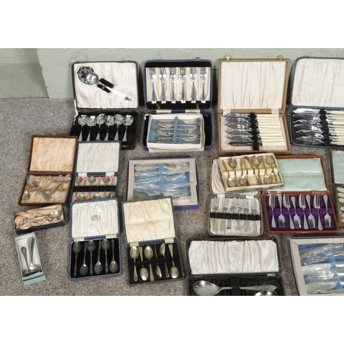 354 - A large box collection of vintage silver plated flatware, including cake knife, fish sets, butter kn... 