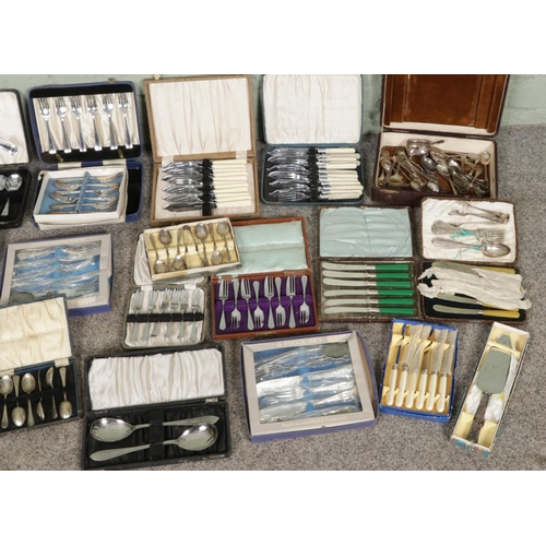 354 - A large box collection of vintage silver plated flatware, including cake knife, fish sets, butter kn... 