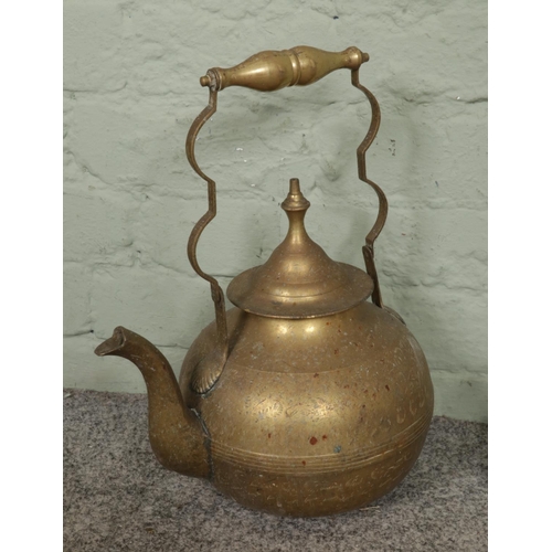 416 - Vintage brassware collection, including a tall kettle with brass handle, a teapot and a stew pot.