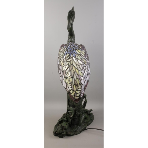 5 - A large Tiffany style table lamp formed as a heron on naturalistic base. Bearing label to the base f... 