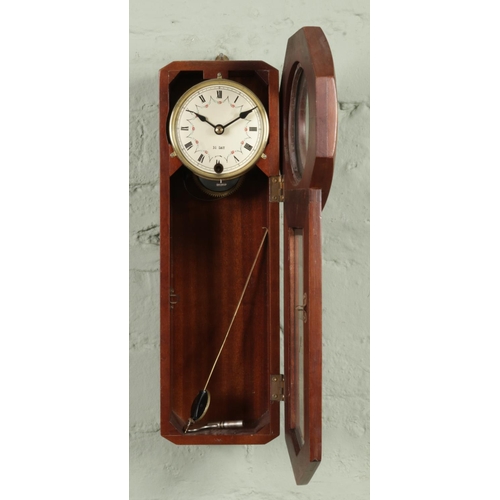 478 - A mahogany cased 31 day 'Regulator A' wall clock, with key. Chiming on the half-hour and hour on a b... 