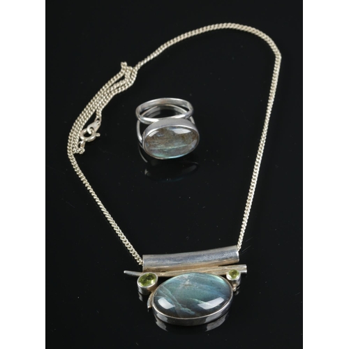 522 - A Labradorite pendant on silver chain together with matching ring