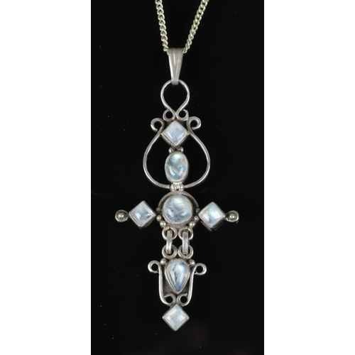 524 - A mid century silver and moonstone pendant on chain.