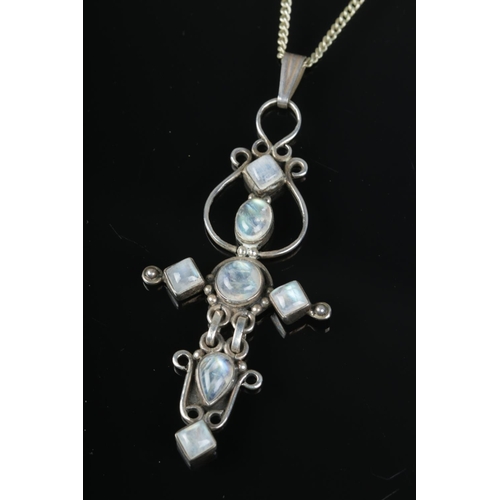 524 - A mid century silver and moonstone pendant on chain.