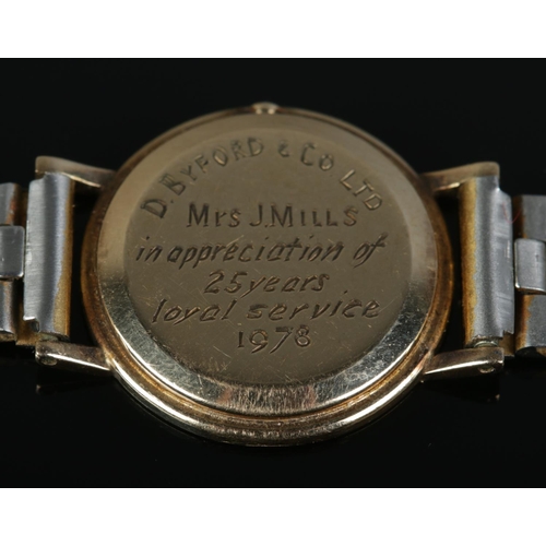 571 - A ladies Rotary wristwatch, featuring 9ct Gold back plate containing inscription to 'Mrs J. Mills' f... 