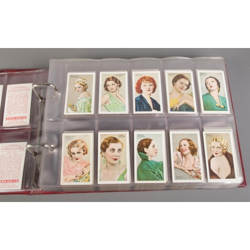 66 - A large quantity of cigarette cards with albums, including two complete albums, six empty albums and... 