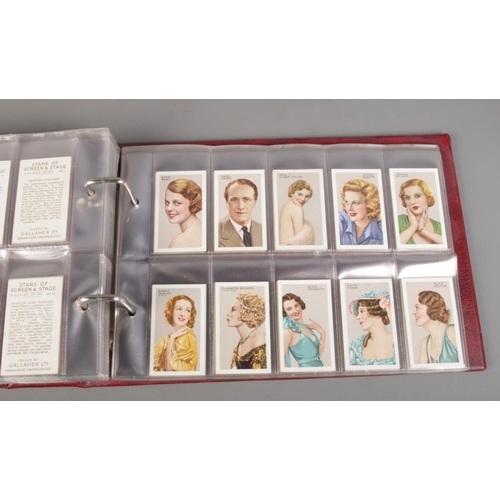 66 - A large quantity of cigarette cards with albums, including two complete albums, six empty albums and... 