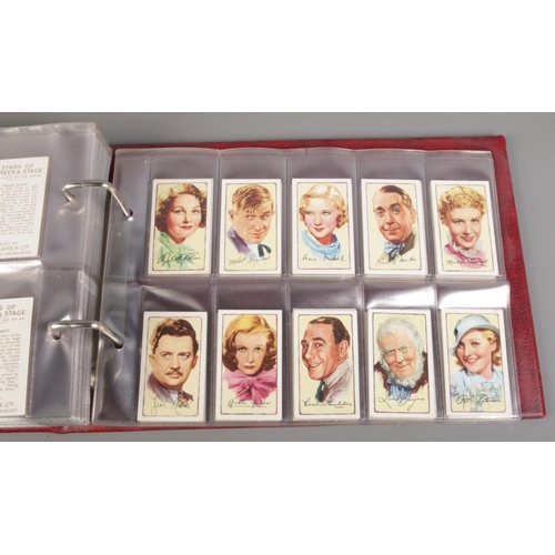 66 - A large quantity of cigarette cards with albums, including two complete albums, six empty albums and... 