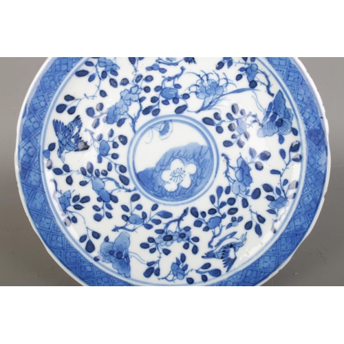 592 - A Chinese Qing Dynasty Kangxi (1662-1722) blue & white porcelain plate, feature branching blossoms a... 