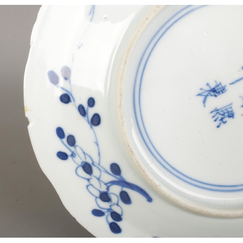 592 - A Chinese Qing Dynasty Kangxi (1662-1722) blue & white porcelain plate, feature branching blossoms a... 