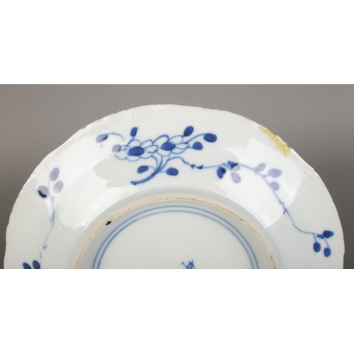 592 - A Chinese Qing Dynasty Kangxi (1662-1722) blue & white porcelain plate, feature branching blossoms a... 