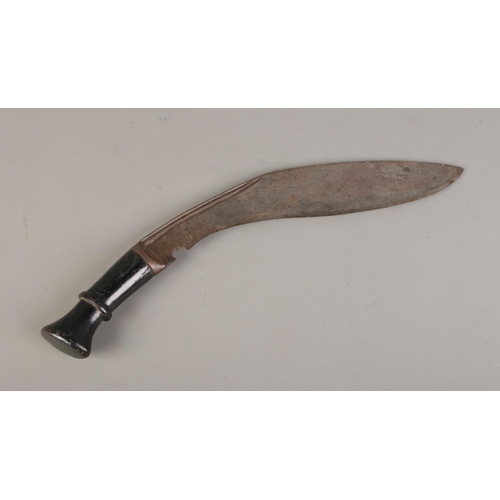 599 - A vintage Kukri knife, carved wood hilt with hooked blade. Length 41cm includes hilt,  blade length ... 