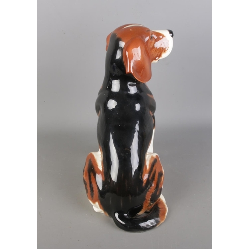 628 - A large vintage Beswick china model of a fireside Beagle dog, bears marks at base of 