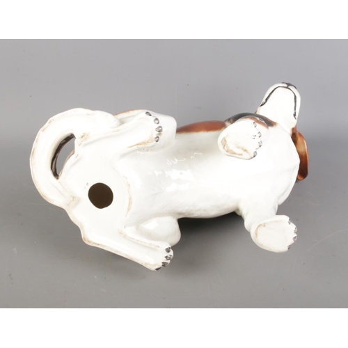 628 - A large vintage Beswick china model of a fireside Beagle dog, bears marks at base of 