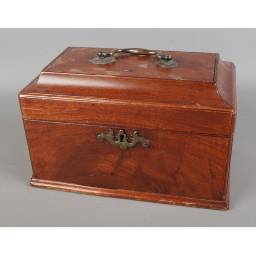 78 - A Victorian mahogany tea caddy featuring brass handle and escutcheon.