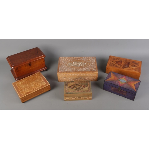 81 - A collection of wooden jewellery and trinket boxes. Including carved and inlaid examples.