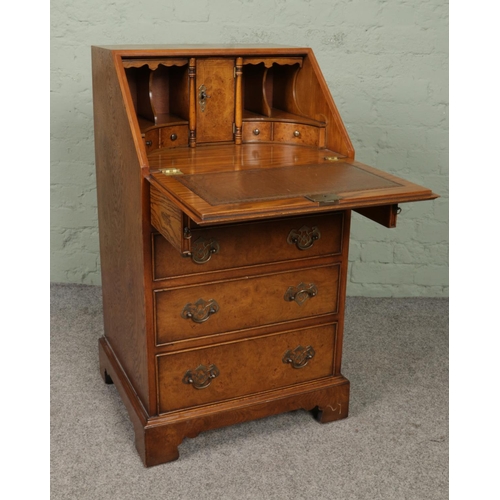 652 - An 18th century style burr walnut bureau of slender proportions 

Hx95cm
Wx52cm
Dx48cm