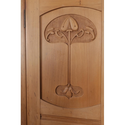 657 - A carved mirror front wardrobe over single drawer featuring floral motif to side panels. Approx. dim... 