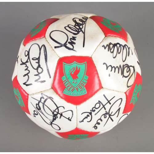 14 - A signed Liverpool FC 100 years centenary football featuring players such as Ian Rush, Bruce Grobbel... 