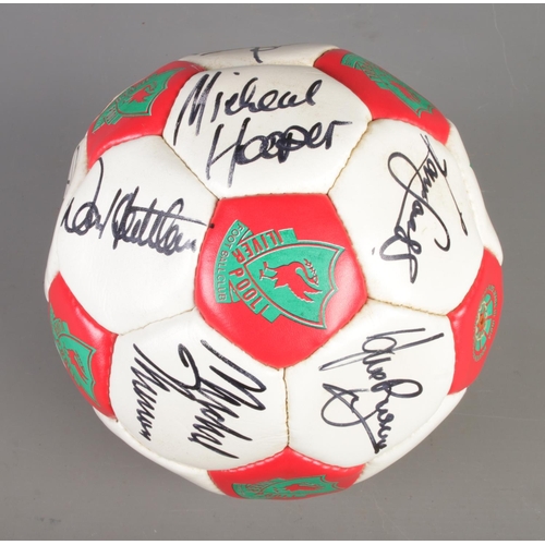 14 - A signed Liverpool FC 100 years centenary football featuring players such as Ian Rush, Bruce Grobbel... 