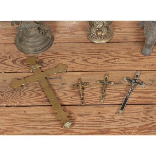 197 - A collection of metal and brassware depicting the religious crucifix of Jesus Christ.