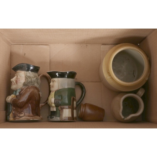 222 - A large box containing an assortment of water jugs, primarily ceramic in various sizes.