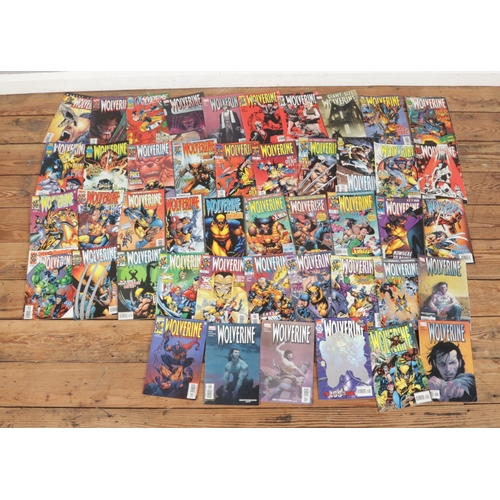 240 - A large collection of Marvel Wolverine comics with series including Civil War, Origins, What Lurks B... 